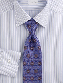 An elegant medallion design crafted in superior silk. Silk Dry clean Made in Italy 