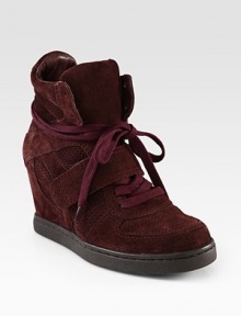 Must-have sneakers rendered in ultra-soft suede, with a hidden wedge and wrap-around laces. Hidden wedge, 4 (100mm)Rubber platform, ¾ (20mm)Compares to a 3¼ heel (80mm)Suede upperLeather liningRubber solePadded insoleImported