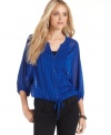 This rich, textured peasant top from DKNY Jeans features semi-sheer fabric for a boho vibe.