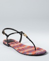 Sandals get dressed-up à la Tory Burch--the Emmy thong flats get the royal treatment with a chic striped footbed and patent leather.