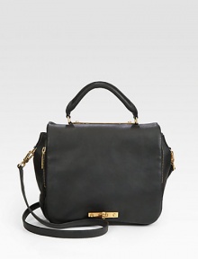 A sleek and minimalist design in supple leather with radiant hardware.Top handle, 4 dropDetachable adjustable shoulder strap, 18-22½ dropTurnlock flap closureOne zip pocket under flapSnap button gussetsOne inside zip pocketTwo inside open pocketsFully lined10½W X 10H X 3DImported A sleek and minimalist design in supple leather with radiant hardware.Top handle, 4 dropDetachable adjustable shoulder strap, 18-22½ dropTurnlock flap closureOne zip pocket under flapSnap button gussetsOne inside zip pocketTwo inside open pocketsFully lined10½W X 10H X 3DImported