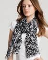 A sheer oblong scarf with linear MARC BY MARC JACOBS printed all over for a statement-making scarf style.