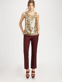 This eye-catching sequin tank will add an extra boost of fierce style to your wardrobe. JewelneckSleevelessWide shoulder strapsAllover sequins in animal printBack zip closureFully linedAbout 25 from shoulder to hem98% viscose/2% elastaneLining; 95% polyester/2% spandexDry cleanImportedModel is 5'9½ (176cm) wearing a US size Small.