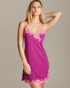 Look pretty in pink in this elegant lace trimmed chemise from Natori.