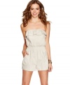 Planet Gold adds whimsy to the safari look, integrating a cute ruffle to a romper that's girlishly utilitarian!