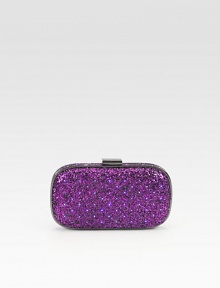Be the star of the party with this unique light-up design in sparkling two-tone glitter.Top clasp closureOne inside open pocket with battery packVelvet lining8W X 4¾H X ½DImported Be the star of the party with this unique light-up design in sparkling two-tone glitter.Top clasp closureOne inside open pocket with battery packVelvet lining8W X 4¾H X ½DImported