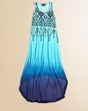 An electric ombré design is given a tribal makeover with an ethnic print and cool hem that's high in the front and low in the back.ScoopneckSleevelessPullover styleHi-lo hemRayonHand washImported