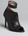 It's a wrap: these Tibi booties are the pinnacle of high style, a cut above the crowd on slim and lofty heels.