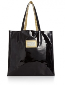 Patently chic, this black-and-gold patent PVC signature tote from Macy's private label features high-gloss style. Patently chic, this black-and-gold patent PVC signature tote from Macy's private label features high-gloss style.