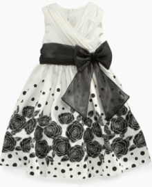 She can make any occasion extra special in this floral dress from Bonnie Jean, with beautiful flower silhouettes adding a striking style accent. She can make any occasion extra special in this floral dress from Bonnie Jean, with beautiful flower silhouettes adding a striking style accent.