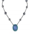 The perfect pop of color. Gorgeous green and blue hues set apart the stunning pendant on this illusion necklace from Carolee. Crafted in hematite tone mixed metal, it's adorned with glass accents and beading. Approximate length: 16 inches + 2-inch extender. Approximate drop: 1-1/2 inches.