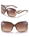 Large oversized sunglasses with with circular open metal temples for a glamorous touch.