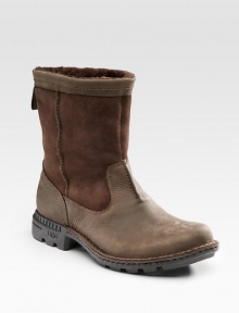 Rugged leather and suede outside, soft, warm shearling inside. This is the ultimate style of the season. Durable stitching details Back pull tab Rubber tread sole Imported Rugged leather and suede outside, soft, warm shearling inside. This is the ultimate style of the season. Durable stitching details Back pull tab Rubber tread sole Imported