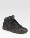 High-top profile fashioned in a smooth, intricately woven design.Leather upperPadded insoleRubber soleMade in Italy