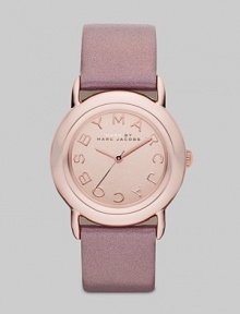 Smart and chic style with leather strap. Quartz movement Water resistant to 5 ATM Round ion-plated rose gold stainless steel case, 33mm (1.3) Rose gold mirror logo dial Second hand Metallic blush leather strap, 18mm wide (0.7) Imported 