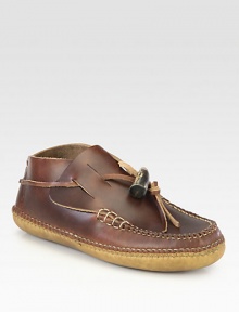 Hand-stitched moccasin expertly crafted in supple leather.Leather upperLeather liningPadded insoleLeather soleMade in USA