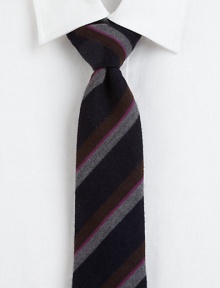 A brilliant take on classic stripes, a fine silk tie that offers unquestionable charm.SilkDry cleanMade in Italy A brilliant take on classic stripes, a fine silk tie that offers unquestionable charm.SilkDry cleanMade in Italy