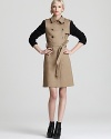 With sleeves bedecked with black beads, this dressed-up Gryphon trench coat boasts editorial credibility to the highest degree. Perfect over a cocktail dress, the color block look has all the details you can expect from this timeless style: a double-breasted cut, epaulets, a storm flap and detachable belt. Don't miss the back kick pleat with snap detail!