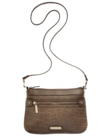 For fierce girls on-the-go, this croc-embossed crossbody from Anne Klein is the perfect companion. Shiny signature hardware dresses the exterior, while plenty of inside pockets and compartments discretely stash wallet, phone, makeup, and other little extras. For fierce girls on-the-go, this croc-embossed crossbody from Anne Klein is the perfect companion. Shiny signature hardware dresses the exterior, while plenty of inside pockets and compartments discretely stash wallet, phone, makeup, and other little extras.