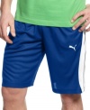 With a cool color-blocked style, these lightweight mesh shorts from Puma raise the bar on your gym gear. (Clearance)