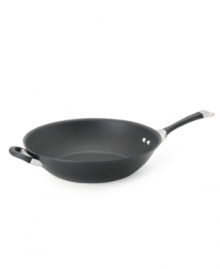 Causing quite a stir for chef's everywhere! High sides and a deep shape make the perfect place to toss around your favorite veggies for unforgettable stir fry made to perfection. Constructed for superior performance with a hard-anodized construction, impact-bonded stainless steel base and dishwasher-safe finish. Lifetime warranty. Causing quite a stir for chef's everywhere! High sides and a deep shape make the perfect place to toss around your favorite veggies for unforgettable stir fry made to perfection. Constructed for superior performance with a hard-anodized construction, impact-bonded stainless steel base and dishwasher-safe finish. Lifetime warranty.