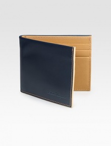 Handsomely crafted calfskin leather features a retro-inspired, two-tone detail with constrast stitching.Six card slots4W x 3¼HMade in Italy Handsomely crafted calfskin leather features a retro-inspired, two-tone detail with constrast stitching.Six card slots4W x 3¼HMade in Italy