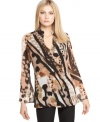 Hardware details add edge to this boldly printed Calvin Klein tunic -- perfect for effortless style!