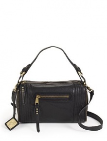 THE LOOKRectangular shapeLeather shoulder and crossbody strapsTop zip closureTopstitched side panels with zipper edgingLogo tagOne outside zip pocketOne inside zip pocket with logo patchTwo inside open pocketsTHE FITAdjustable shoulder strap, 5-7 dropRemovable, adjustable shoulder strap, 21½-25½ drop11½W X 7½H X 5DTHE MATERIALLeatherFully linedORIGINImported THE LOOKRectangular shapeLeather shoulder and crossbody strapsTop zip closureTopstitched side panels with zipper edgingLogo tagOne outside zip pocketOne inside zip pocket with logo patchTwo inside open pocketsTHE FITAdjustable shoulder strap, 5-7 dropRemovable, adjustable shoulder strap, 21½-25½ drop11½W X 7½H X 5DTHE MATERIALLeatherFully linedORIGINImported