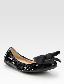 EXCLUSIVELY AT SAKS. Patent leather style with nylon bow and logo detail. Patent leather upperLeather liningRubber solePadded insoleImportedOUR FIT MODEL RECOMMENDS ordering one half size up as this style runs small. 