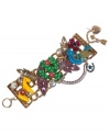 Go west with this desert-inspired toggle bracelet from Betsey Johnson. Crafted in antique gold tone mixed metal, this wide multi-link bracelet features a green cactus charm with crystal accents and pink flowers, silver tone feathers with pink-colored crystal accents, gold tone feathers, fuchsia-colered crystal 4-leaf clover, yellow horse with pink flower detail, silver tone horseshoes and a blue bird with crystal accents. Approximate length: 8 inches.