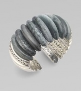 This exceptional cuff design circles the wrist with agate stones and sterling silver.Agate Sterling silver Width, about 1½Diameter, about 2Made in Bali
