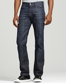 These straight leg 7 for All Mankind jeans in a weathered rinse sit low on the waist with a slim fit through hip and thigh and slight tapering at the ankle. Back pocket signature squiggle detail. These straight leg 7 for All Mankind jeans in a weathered rinse sit low on the waist with a slim fit through hip and thigh and slight tapering at the ankle. Back pocket signature squiggle detail.