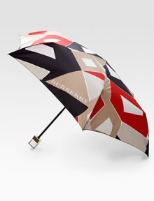 Medium-sized umbrella in a modern geometric pattern with automatic open and close button. Open diameter, about 40 Folded length, about 9 100% polyester Imported Medium-sized umbrella in a modern geometric pattern with automatic open and close button. Open diameter, about 40 Folded length, about 9 100% polyester Imported