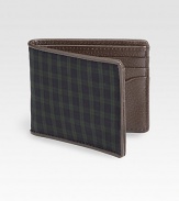 Made from the classic blackwatch tartan, the colors of a historic Scottish force, this bill holder is edged with boarskin embossed leather for a signature feel.One billfold compartmentSix cards slotsCotton/leather4W x 4HImported