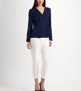 Elegantly simple, in lustrous stretch silk with a double wing collar and pleat on one side for a modern edge.V neckline with wing collar, double on one sideLong straight sleevesAngled pleat on one sideHidden placket closureAbout 24 from shoulder to hem92% silk/8% elastaneDry cleanImported Model shown is 5'9½ (176cm) wearing US size Small. 