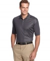 Stay and play dry in this handsome golf shirt by Greg Norman for Tasso Elba.