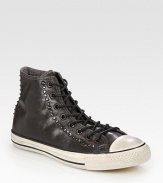 Unexpected studs transform this smooth leather classic into a rocker-sleek must-have. Leather liningPadded insoleRubber soleImported