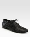 This classic oxford style makes a bold statement with perforated mesh detail for a unique finish.Lace-upLeather soleMade in Italy