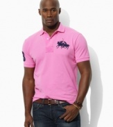 A relaxed, classic-fitting polo shirt in breathable cotton mesh exudes heritage style with Ralph Lauren's embroidered Dual Match players at the chest.