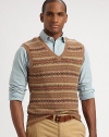 Knit from the finest cotton and cashmere yarns for a smooth hand, this timeless sweater vest is emboldened with a heritage Fair Isle pattern.V-neckRibbed knit collar, sleeves and hem85% cotton/15% cashmereDry cleanImported