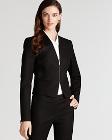 Traditional workday chic takes a modern turn with this minimalist Anne Klein New York jacket. Layer over a crisp white blouse for a military-inspired finish.