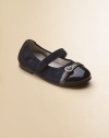 Dual suede and patent leather fabrics and a decorative rhinestone buckle add chic style to this classic silhouette. Grip-tape closure Suede and patent leather upper Rubber sole Padded insole Pigskin lining Imported