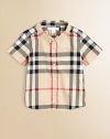 Fashioned in the renowned check design, this breezy cotton button-down features a shirttail hem and patch pocket.Button-down collarShort sleevesButton-frontFront patch pocketShirttail hemCottonMachine washImported Please note: Number of buttons may vary depending on size ordered. 