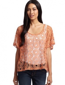 THE LOOKScoop necklinePullover styleShort dolman sleevesOpen weave crochet designTHE FITLoose fit silhouetteAbout 23 from shoulder to longest point of hemTHE MATERIALCottonCARE & ORIGINDry cleanImported