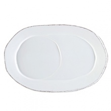 An effortless collection that transitions seamlessly from your kitchen to the table, these exceptional serving dishes solidify your presentation with down-to-earth elegance. Crafted in Tuscany from Italian stoneware, and featuring unique, rustic shapes with modern details, these pieces are built to last, both in terms of style and functionality. An effortless collection that transitions seamlessly from your kitchen to the table, these exceptional serving dishes solidify your presentation with down-to-earth elegance. Crafted in Tuscany from Italian stoneware, and featuring unique, rustic shapes with modern details, these pieces are built to last, both in terms of style and functionality.