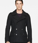 Sophisticated and sleek, this handsome pea coat in warm wool exudes modern luxury in a trim silhouette with supple leather trim.