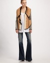 Versatile, patchwork design has a removable oversized collar and long rib-knit sleeves that create a vest effect. V-neck with removable collar Front snap tabs Long cable-knit sleeves Curved hem Fully lined About 26 from shoulder to hem 62% viscose/38% polyester faux fur lining 57% acrylic/43% polyester Dry clean Made in Italy