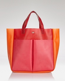 Work Anya Hindenmarch's tongue-and-chic style with this rubber tote. A cute and quirky take on color blocking, this extra loves rainy days, denim and ankle booties. Work Anya Hindenmarch's tongue-and-chic style with this rubber tote. A cute and quirky take on color blocking, this extra loves rainy days, denim and ankle booties.