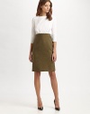 Cotton boatneck pairs with a high-waisted wool tweed skirt for a look that smoothly transitions from work hours to after hours. BoatneckThree-quarter sleevesAttached wool skirtSlash pocketsInvisible back zipperAbout 23 from natural waistBody: WoolContrast: CottonDry cleanImportedModel shown is 5'10 (177cm) wearing US size 4.