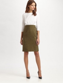 Cotton boatneck pairs with a high-waisted wool tweed skirt for a look that smoothly transitions from work hours to after hours. BoatneckThree-quarter sleevesAttached wool skirtSlash pocketsInvisible back zipperAbout 23 from natural waistBody: WoolContrast: CottonDry cleanImportedModel shown is 5'10 (177cm) wearing US size 4.